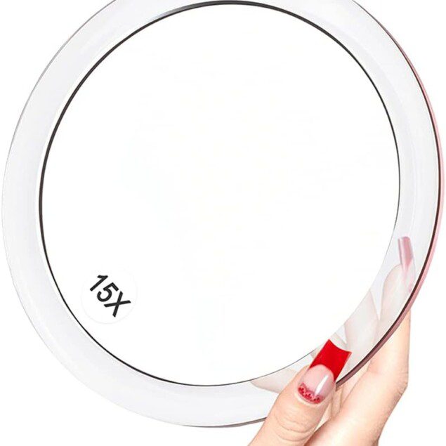 Miroir grossissant 15X : indispensable pour les passionnées de maquillage et d'épilation  Optimisez votre routine beauté avec un miroir rond de 15 cm, facile à installer grâce à ses trois ventouses, pour une précision inégalée dans l'élimination des points noirs et imperfections.