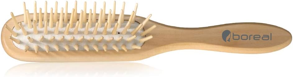 Brosse à cheveux en bois naturel : l'outil antistatique parfait pour des cheveux brillants et démêlés