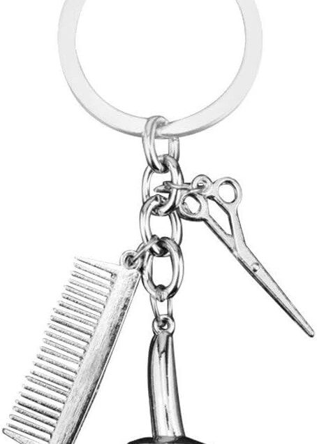 Porte-clés en forme de beauté : un accessoire élégant pour les passionnés de mode Ajoutez une touche glamour à votre sac à main avec ce porte-clés unique, parfait pour sublimer vos clés et accessoires de coiffure
