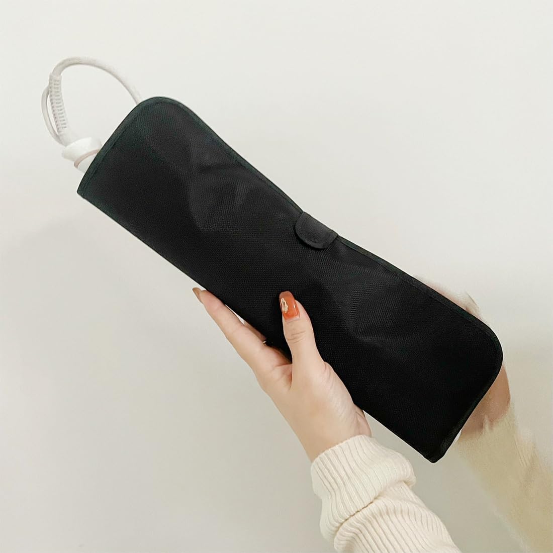Tapis de fer à lisser et pochette : l'accessoire idéal pour les voyageurs soucieux de la chaleur – Image 3