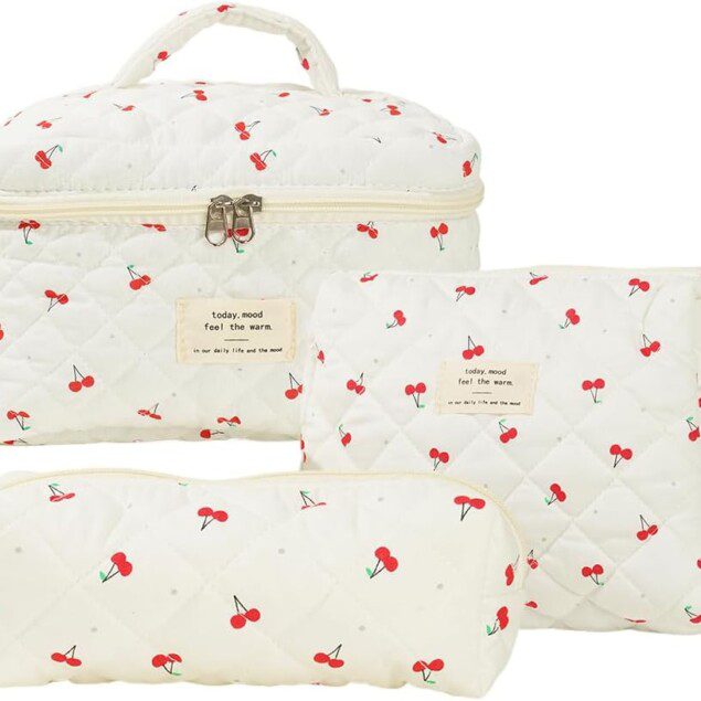 Trousse de toilette matelassée pour femme : élégance et praticité en voyage Découvrez notre lot de 3 trousses en coton doux, idéales pour ranger votre maquillage avec style