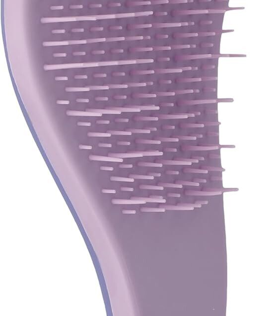 Brosse à cheveux démêlante : l'alliée idéale pour les femmes souhaitant un lissage doux et rapide