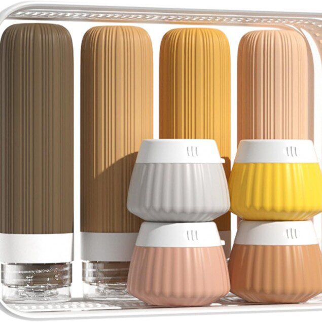 Kit voyage pour les aventuriers : flacons en silicone rechargeables et étanches, 14 pièces colorées pour un voyage sans tracas