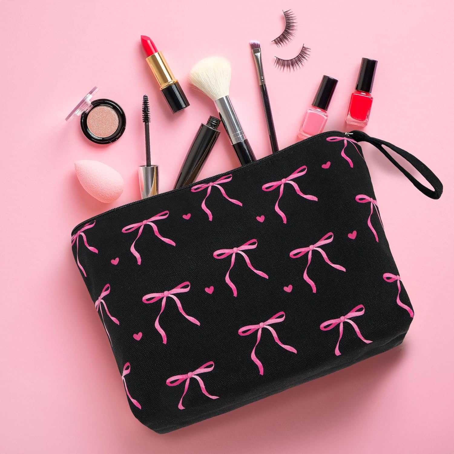 Trousse de toilette femme voyage : l'élégance en noir avec un motif nœuds roses pour un maquillage toujours en beauté – Image 3