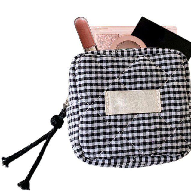 Petite trousse de maquillage : un sac cosmétique noir pratique pour les voyages et le quotidien