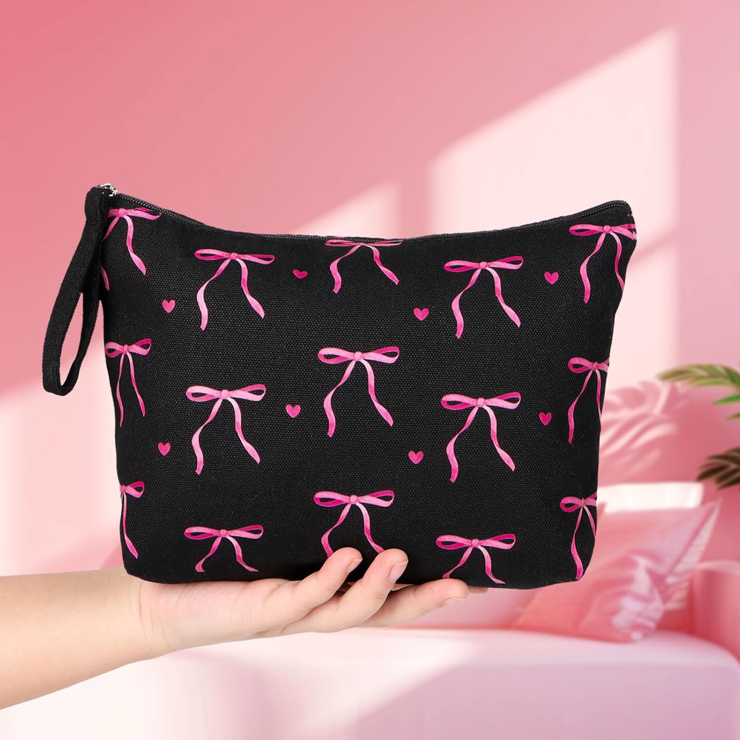 Trousse de toilette femme voyage : l'élégance en noir avec un motif nœuds roses pour un maquillage toujours en beauté – Image 6