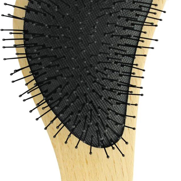 Brosse démêlante en bois FSC : l'alliée parfaite pour les cheveux sensibles
